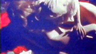 Blue-tinted Vintage Loop Shows Retro Couple in Raw 70s Action