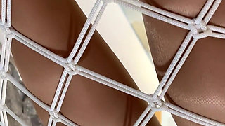 Nylon-clad Goddess in Hammock Slave Licks Through Pantyhose and Panties
