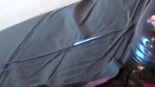 Latex Danielle masturbating in army catsuit