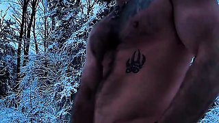 Ripped viking playing with himself outside in nature