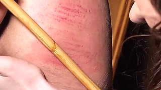 Slave Mila's Ass & Back Welt Marked Red by Goddess Vivienne L'amour's Relentless Whipping and Caning Lashes in Extreme Dominatio