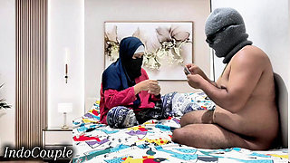 Beautiful Indonesian Muslim Hijab-wearing Wife and Her Real Partner Playing Cards