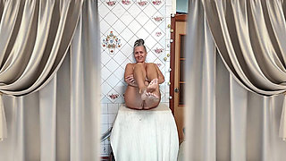 Hot Housewife Lukerya Teases with Her Hips and Feet in the Kitchen