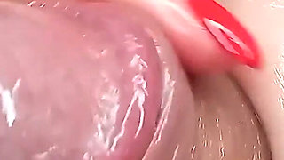 She Extracts Sperm by Massaging the Meaty Head of the Dick