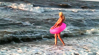 Hot naked blonde on the beach