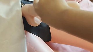 Hot asian girl with hairy pussy fucks with a sex doll and rides its cock