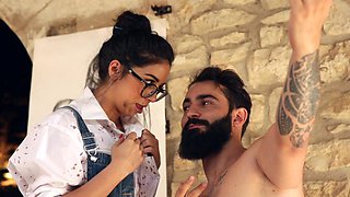 Brunette Julia and Miguel in wild outdoors