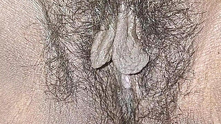 The village woman is showing her large pussy