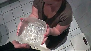 Drinking his piss from tupperware