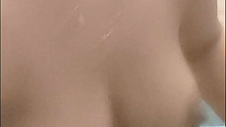 Desi bhabhi house wife taking shower rubbing boobs and pussy