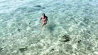 Bodacious bikini model showing off perfect curves outdoors