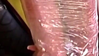 Plastic Wrapped Slut Gaping Wide Through Shiny Film