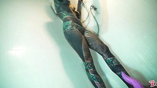 Intensely tattooed model mighty anal masturbation in the bathroom