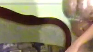 Ines Cudna in Foil Lingerie and Bottle