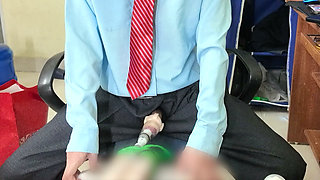 An older man is using a sperm collection device