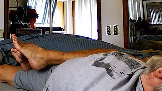 Auntie Ann Plays with Pussy While Giving Footjob
