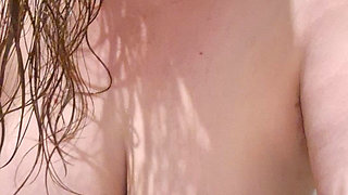 Curvy MILF Takes Shower Flashing All