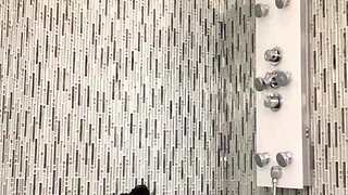 Hot babe with perfect big boobs taking shower