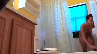 Stepdaughter 21 shaves pussy in shower (voyeur)