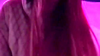 Smoking a Cigarette Outdoor While Wearing Only a Bikini and a Jacket