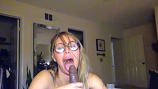 Small tit brunette gives blowjob to a big cock