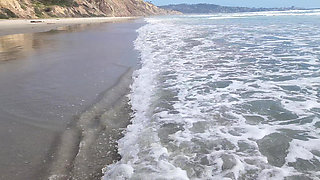 Playing at the nude beach.