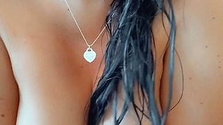Busty curly brunette with big boobs fucks on couch