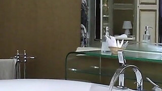Curvy Mature Redhead Adelina Shows off Her Big Butt and Fingers Herself in Bath