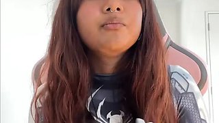Small desi girl Mia Z masturbates and reacts to hentai