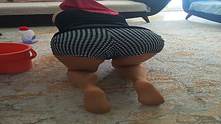 My big-buttocked, turbaned stepmother while cleaning