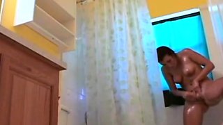 Stepdaughter 21 shaves pussy in shower (voyeur)