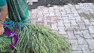 Indian wife sewing on the machine but she has other thoughts too.