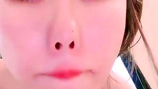 Sweet beauty masturbating on webcam close up