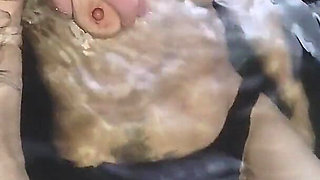 Relaxing in the Jacuzzi, They're Massaging My Breasts