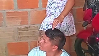 Mechanic Measures the Oil of the Neighbor's Motorcycle