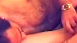 Curly Haired MILF Devours Throbbing Cock in Sloppy Blowjob Frenzy