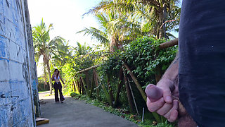 Risky handjob for hot redhead on the walk in the park in public!