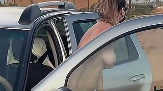 Naked Busty Blonde Walks by Car on Public Road