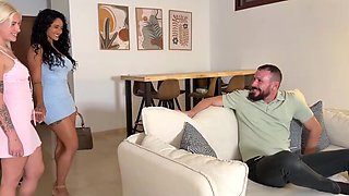 Two slender babes start a passionate threesome banging with their stacked friend on the sofa