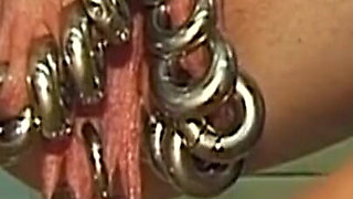 Redhead MILF Shows off Her Extreme Piercings