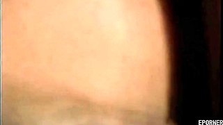 Vintage brunette beauty indulges in playful passion with captivating charm