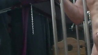 Old guy caged by dominant milf