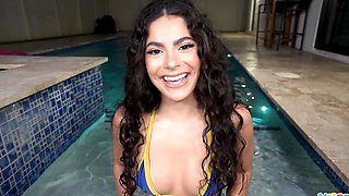 Hot latina Angel Gostosa gets banged by the pool in a steamy scene.