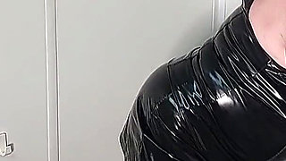 Kinky Granny Fingers Herself on Toilet in Latex