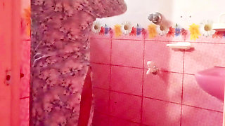 A Bangladeshi-Bihari woman is engaging in romantic sex inside the bathroom while bathing.