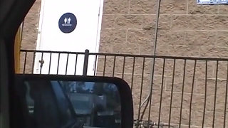 Busty Blonde Swallows a Big Cock Through Gloryhole in the Public Toilet