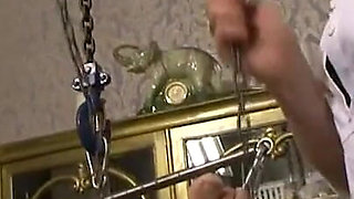 Sexy doctor hangs me upside down, pisses in my mouth and jerks me off