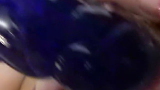 Blue Glass Dildo Through Nude Pantyhose